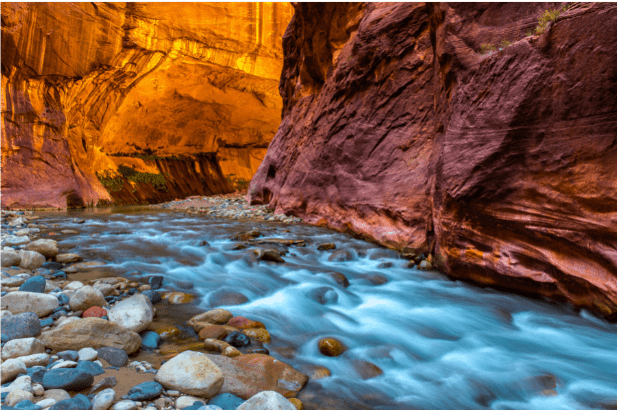 Weeping Rock in Zion National Park offers a unique and picturesque hiking destination, featuring a rock formation that appears to weep water droplets from the sandstone cliffs.