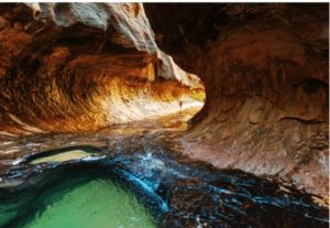 The Subway is a unique and challenging hiking trail in Zion National Park that takes hikers through a stunning slot canyon with cascading waterfalls and narrow passageways.