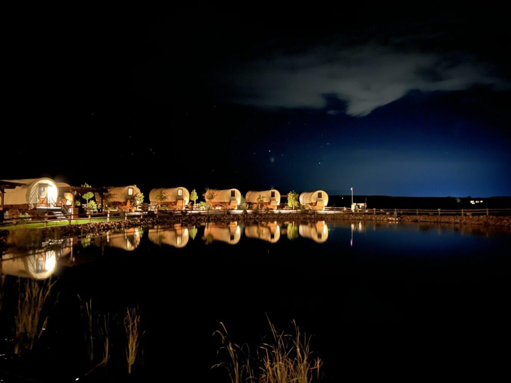 Nightime Pond View Of Zion White Bison Resort
