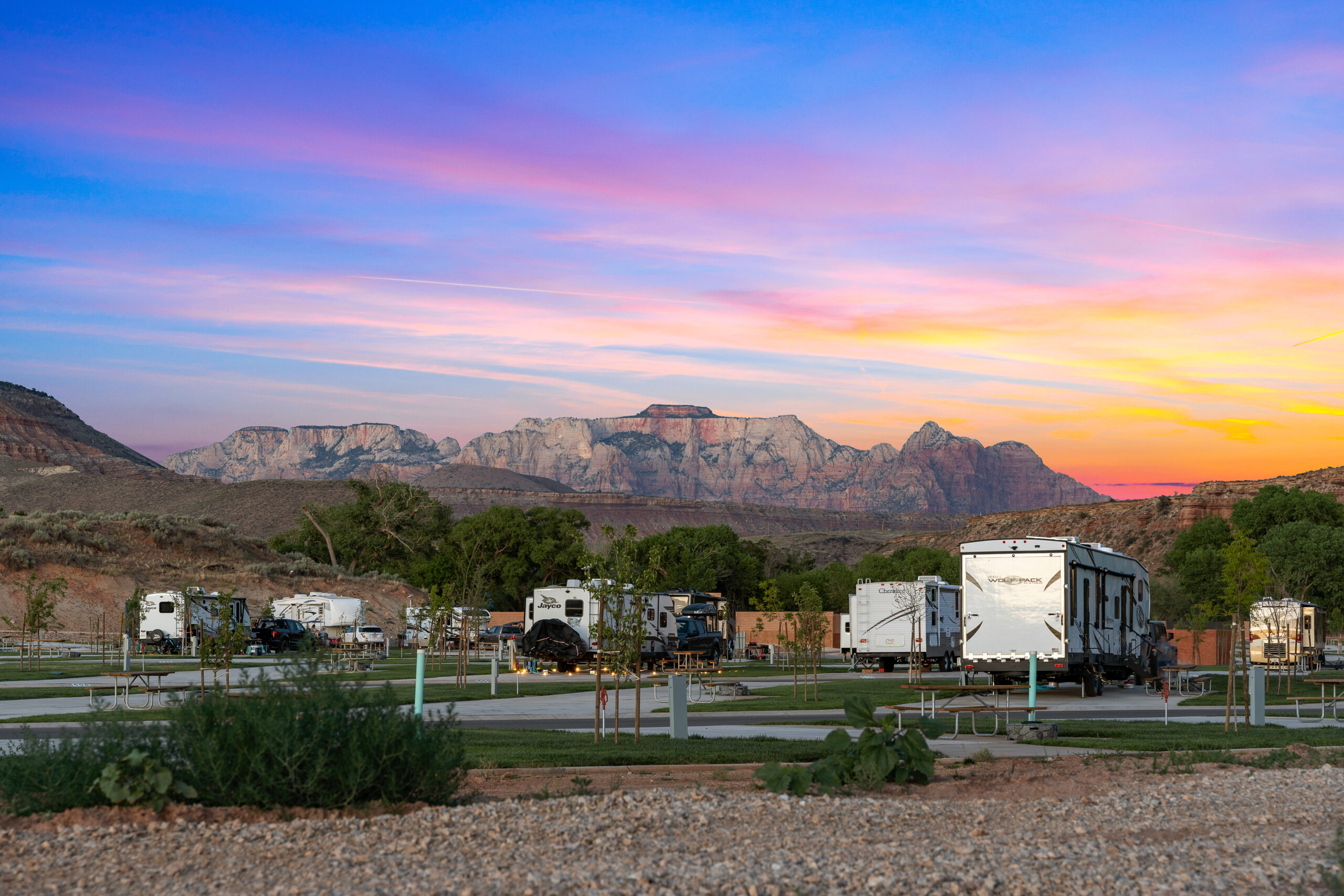 RV Resort In Zion with cliffs of Zion Behind at sunset